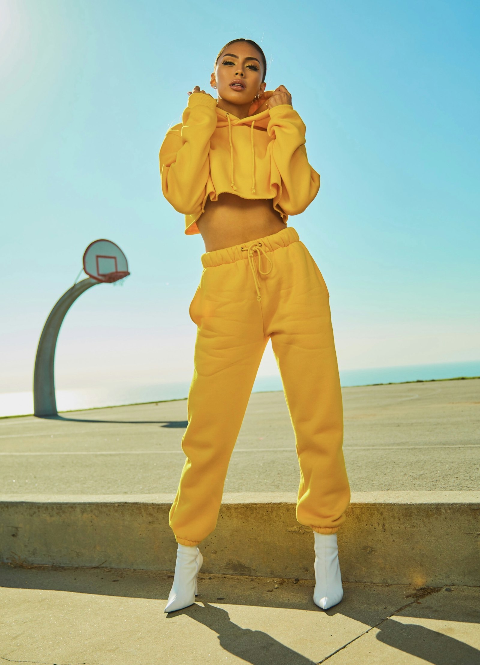 Street style model wearing casual apparel for try-on video reference