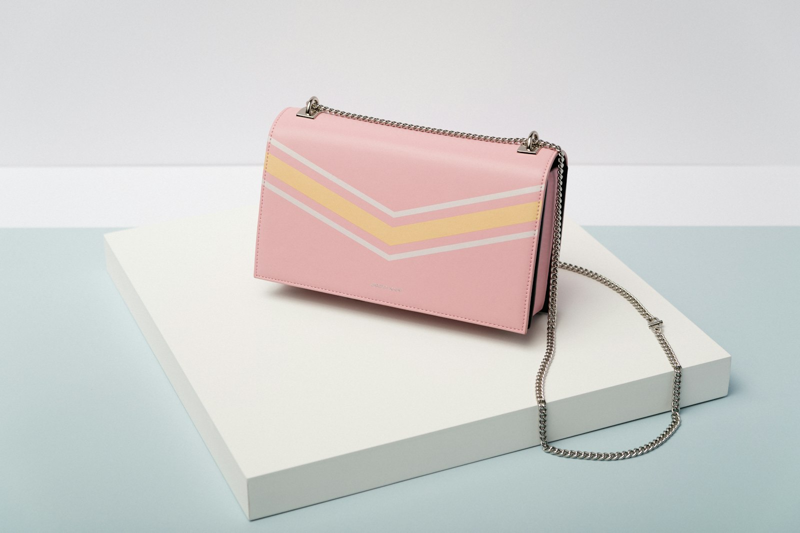 Handbags on a retail shelf for AI handbag catalog video workflow