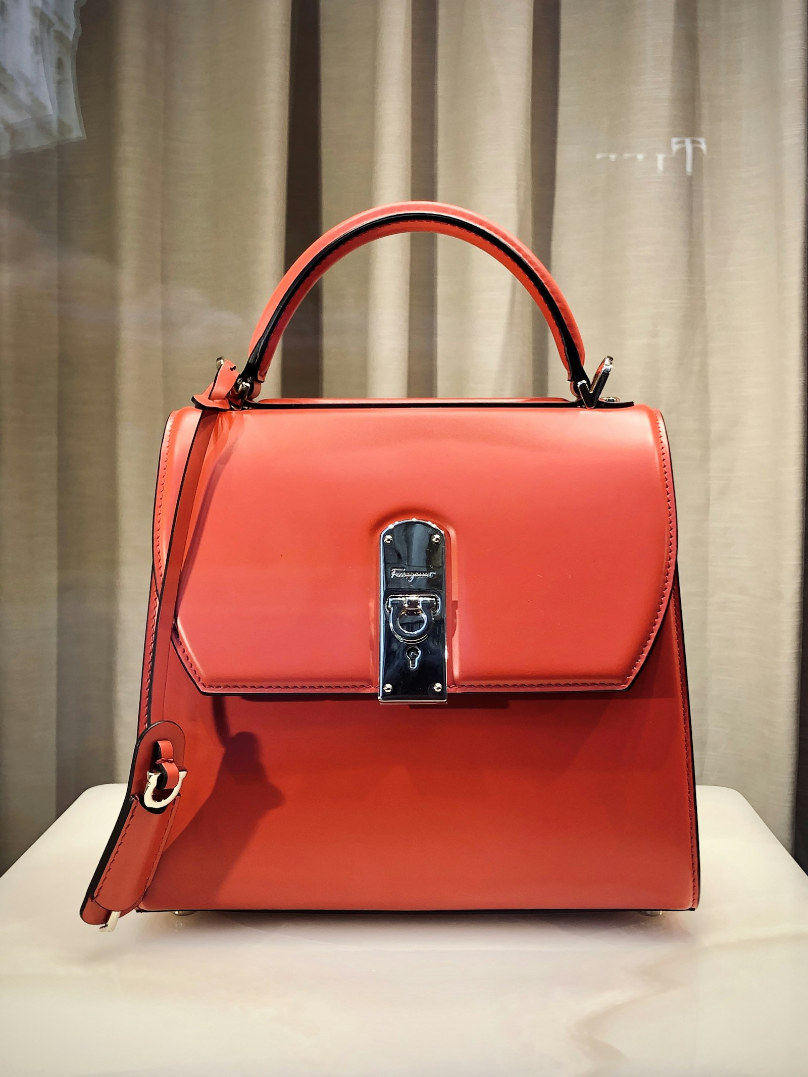 AI handbag product video — studio leather bag packshot